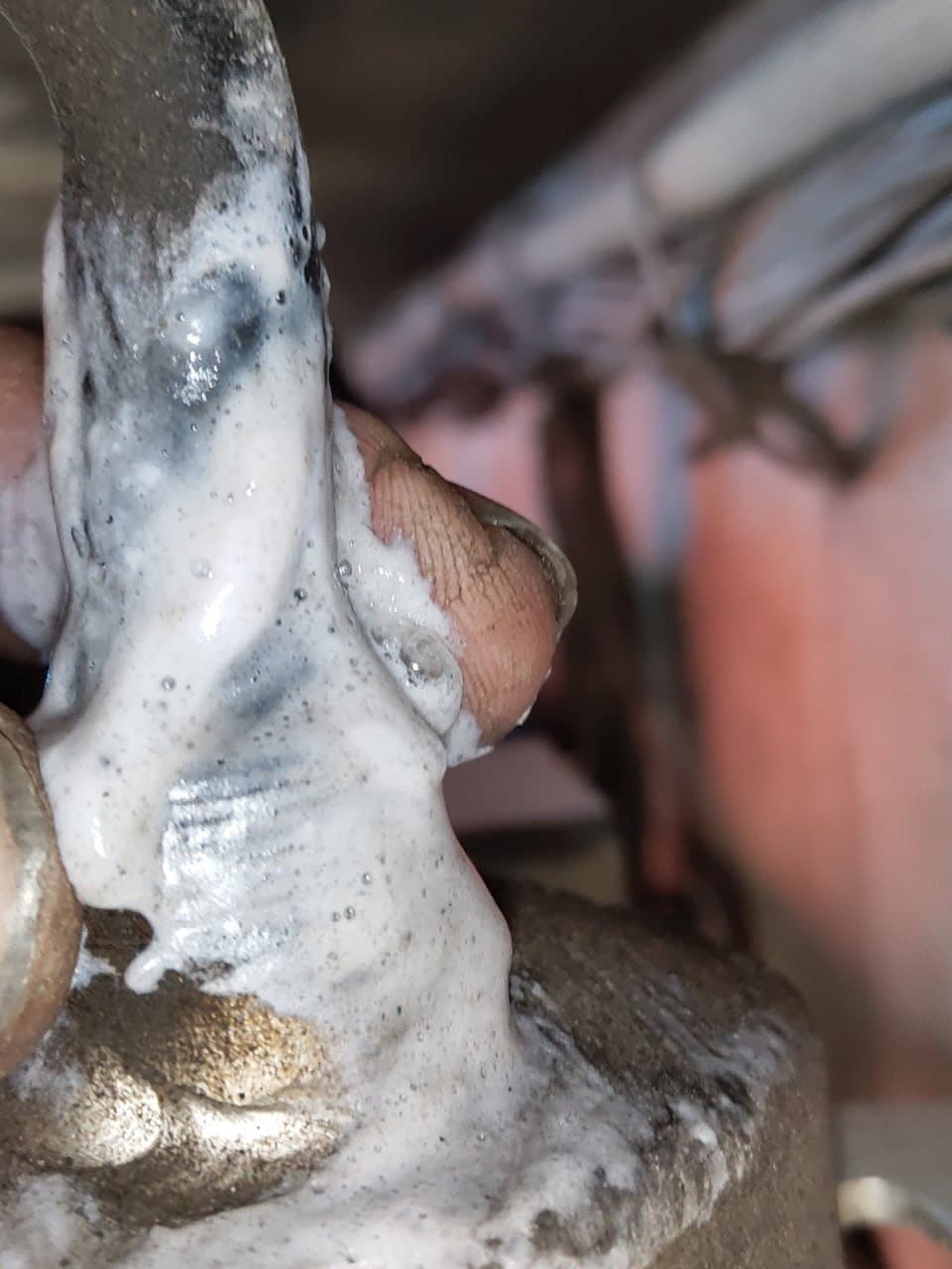 Locating the refrigerant leak with soap foam on a Star Cool joint